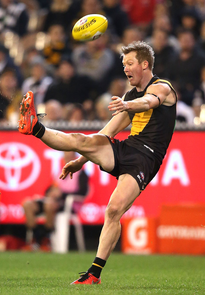 AFL 2016 Rd 20 - Richmond v Collingwood MELBOURNE, AUSTRALIA - AUGUST 05: Jack Riewoldt of the Tigers kicks a goal during the 2016 AFL Round 20 match between the Richmond Tigers and the Collingwood Magpies at the Melbourne Cricket Ground on August 05, 2016 in Melbourne, Australia. (Photo by Justine Walker/AFL Media)